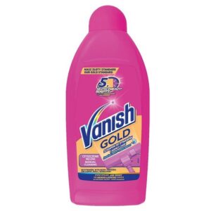 The image shows a bright pink bottle of Vanish Gold Carpet Care liquid detergent. The label at the top reads "NASZ ZŁOTY STANDARD" (Our Gold Standard) and features a "5x SKUTECZNIEJSZY" (5x More Effective) benefits badge. The Vanish logo is prominently displayed in blue, white, and pink, with "GOLD" written below it in gold text. Below this, it says "SZAMPON DO DYWANÓW" (Carpet Shampoo) and "CARPET CARE." The label also highlights "Czyszczenie Ręczne" (Manual Cleaning) and an image of a carpet cleaning tool. The bottom of the label promises "FOR NEWER-LOOKING CARPETS" and mentions "Manual Cleaning" in English as well. The overall design emphasizes its superior cleaning effectiveness and ease of use.