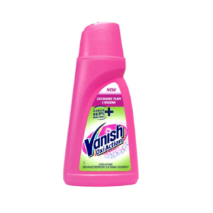 The image shows a bright pink bottle of Vanish Oxi Action stain remover. The label at the top reads "NEW" and "USUWANIE PLAM I HIGIENA" (Stain Removal and Hygiene). A green section on the label highlights "ZABIJA 99.9% BAKTERII" (Kills 99.9% of Bacteria) with a cross symbol. The Vanish logo is prominently displayed in blue, white, and pink, with the text "Oxi Action" below it. The bottom of the label mentions "EXTRA HIGIENA ODPŁAMIACZ BEZPIECZNY DLA TKANIN I KOLORÓW" (Extra Hygiene Stain Remover Safe for Fabrics and Colors). The design features bubbles and sparkles, emphasizing its cleaning power and effectiveness.