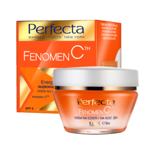 An image of Perfecta's "Fenomen C TH" day and night cream. The product comes in an orange jar with a white lid, containing 50ml of cream. The packaging is vibrant orange with gold accents. The label on the jar includes the brand name "Perfecta," the product line "Fenomen C TH," and mentions that it is an energy-boosting, deeply moisturizing cream for ages 50+. The box behind the jar features the same branding and product details, emphasizing its SPF 6 protection and complex C TH ingredient.