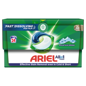 Box of Ariel All-in-1 Pods Mountain Spring with 24 pods, featuring a green background, a graphic of a pod with blue, white, and green sections, and an image of mountains. The packaging highlights "Fast Dissolving Pod Film" and "Effective Stain Removal even in Cold & Short."