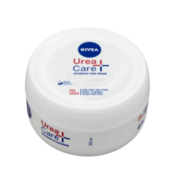 Container of NIVEA Urea Care Intensive Care Cream. The round white tub features the NIVEA logo in blue and red. Text on the container indicates it contains 5% urea and is formulated for very dry skin, specifically targeting body, elbows, hands, and feet.