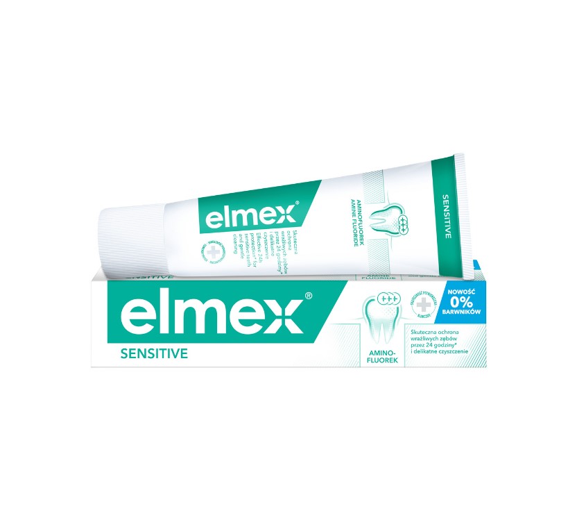 A tube and box of Elmex Sensitive Toothpaste with Amino Fluoride, designed for sensitive teeth, providing 24-hour protection and gentle cleaning, free from colorants.