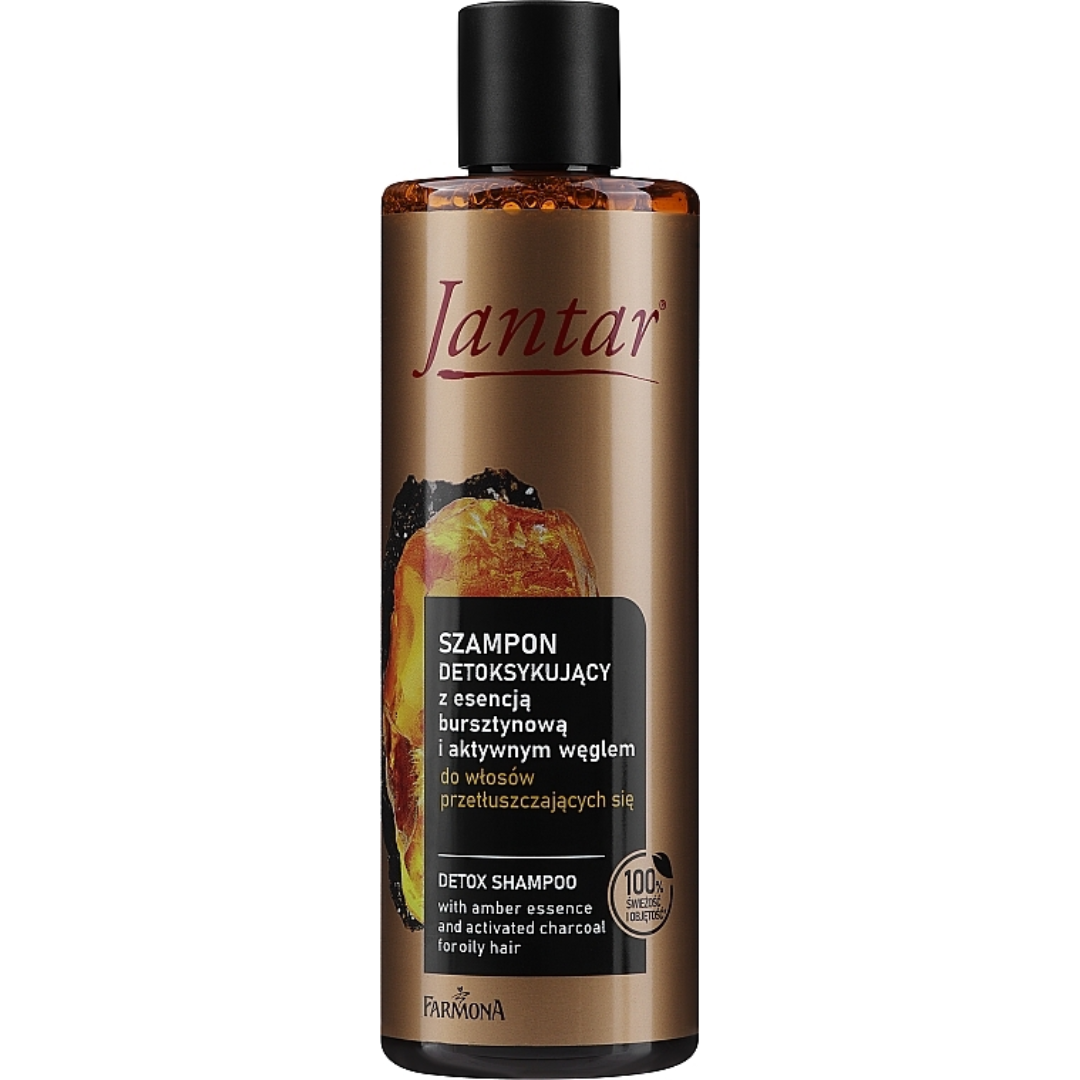Bottle of Jantar Detox Shampoo with amber essence and activated charcoal for oily hair, 330ml.