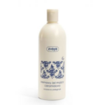 Ziaja Ceramide Creamy Wash Gel in a cream-coloured bottle with a blue decorative label.